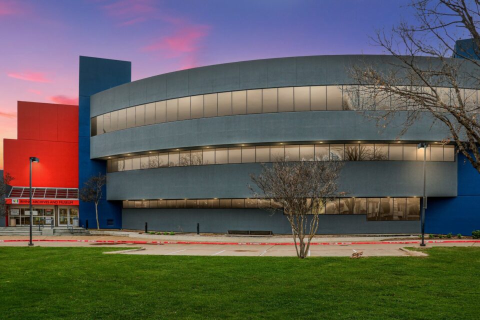 Modern exterior building of a large museum at dusk.