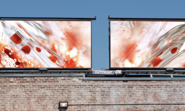 Two large billboards with abstract colors.